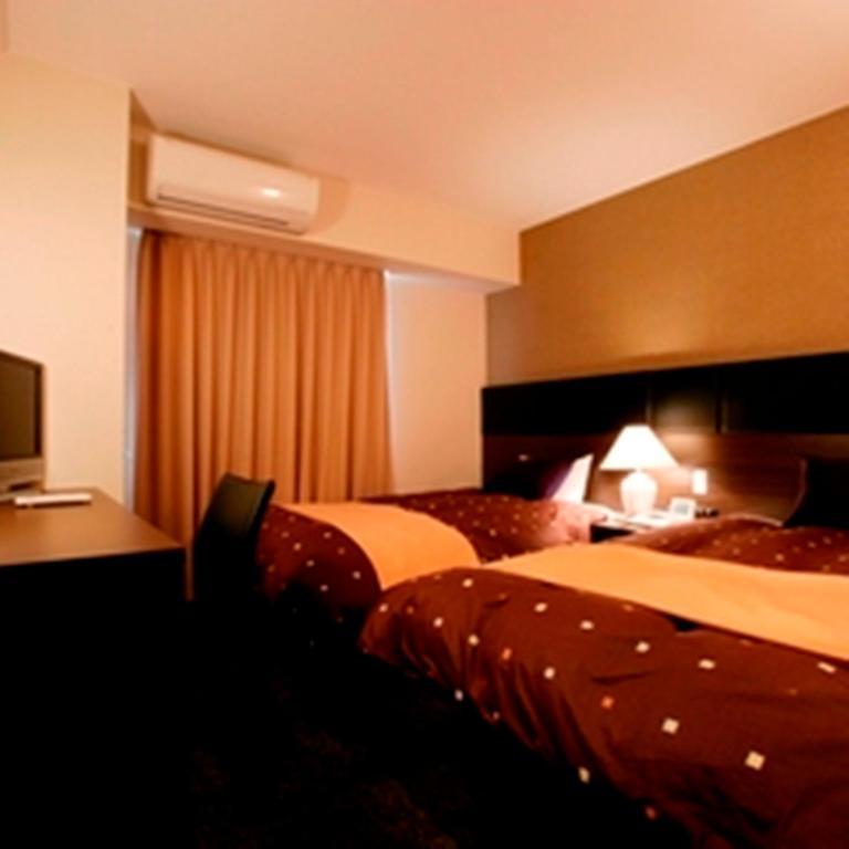 Hotel 1-2-3 Takasaki Quarto foto